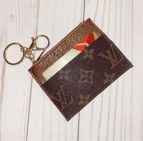 louis vuitton fur keychain replica|authentic louis vuitton keychain.